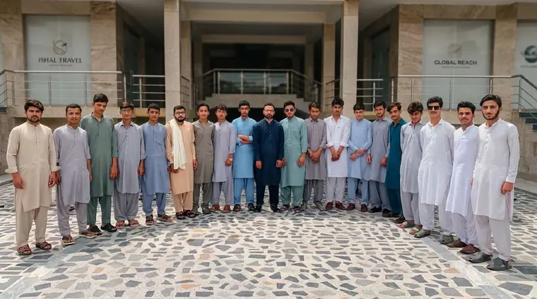 KISI batch standing with their instructor outside the training centre entrance